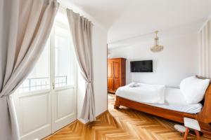 Posteľ alebo postele v izbe v ubytovaní Little Chateau