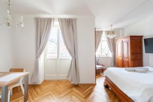 Posteľ alebo postele v izbe v ubytovaní Little Chateau