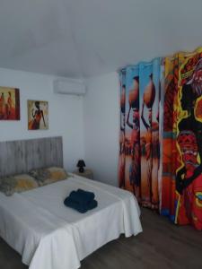 Postel nebo postele na pokoji v ubytování LE PETIT PARADIS