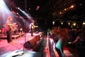 a band playing on a stage at a concert at Century Casino & Hotel Edmonton in Edmonton