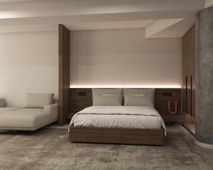 Voodi või voodid majutusasutuse Hotel Atlantiis Suites Near IGI Airport toas