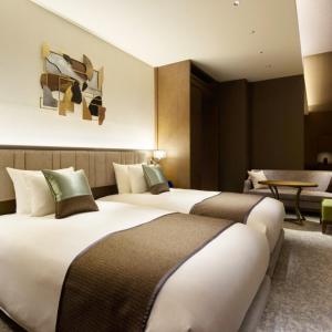 Voodi või voodid majutusasutuse Hotel Atlantiis Suites Near IGI Airport toas