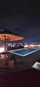 Πισίνα στο ή κοντά στο Depto GAUSS con pileta 4pax