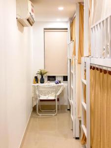 a dressing room with a table and a mirror at Chiri Homestay in Thôn Trường Giang