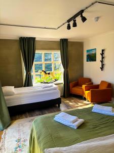 Una cama o camas en una habitación de Brú Country Estate