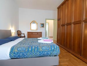 Ένα ή περισσότερα κρεβάτια σε δωμάτιο στο Mountain View Apartment Lecco Centro