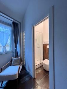 Postel nebo postele na pokoji v ubytování DIMOR'A' ROOMS