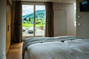 Katil atau katil-katil dalam bilik di Hotel Seepark Thun