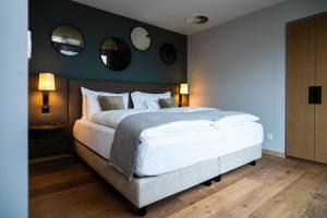 Katil atau katil-katil dalam bilik di Hotel Seepark Thun