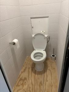a bathroom with a toilet in a stall at Studio piscine parking Cannes in Cannes