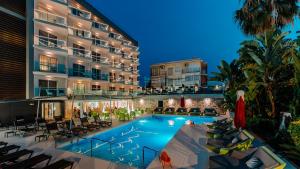 an image of a hotel with a swimming pool at Essence Hotel Boutique in Torremolinos