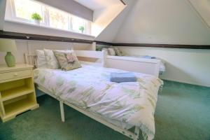 Ένα ή περισσότερα κρεβάτια σε δωμάτιο στο K Suites - Teign House