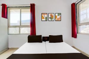 Katil atau katil-katil dalam bilik di Hotel O Paradise