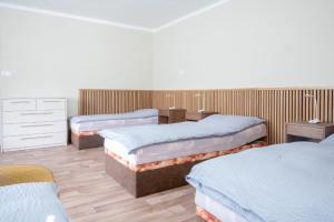 Postel nebo postele na pokoji v ubytování Farma u Tošovských