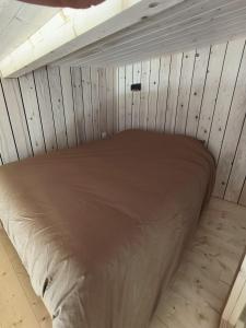 En eller flere senge i et værelse på Gîte chez Julia cosy en bois avec son jardin + 6 billeder