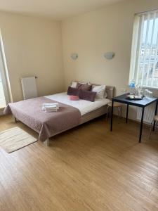 Un ou plusieurs lits dans un hébergement de l'établissement Palanga City center