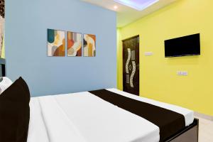 TV a/nebo společenská místnost v ubytování Hotel O The Orchid Residency