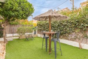 Κήπος έξω από το Chambres D'hotes Au Bougainvillier