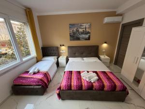Postel nebo postele na pokoji v ubytování Desire guest House