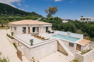 an image of a villa with a swimming pool at Angel Villa Zante in Lithakia