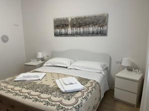Postel nebo postele na pokoji v ubytování Station Inn Roma - Ciampino