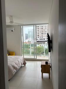 Postel nebo postele na pokoji v ubytování Moderno apartamento en Playa Salguero + 19 fotografií