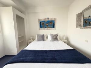 Posteľ alebo postele v izbe v ubytovaní Apartamentos Formentera Copacabana 28