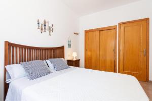 Posteľ alebo postele v izbe v ubytovaní Sunset Village