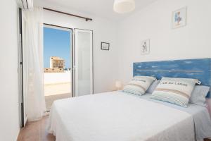 Posteľ alebo postele v izbe v ubytovaní Sunset Village