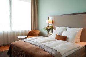 Postel nebo postele na pokoji v ubytování Clarion Hotel Arlanda Airport Terminal