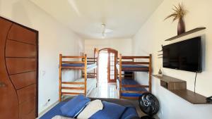 Postel nebo postele na pokoji v ubytování Casarão 121 - Guest House
