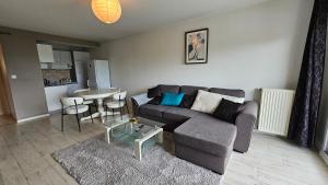 Kuchyň nebo kuchyňský kout v ubytování Francheville - balcon - parking - wifi