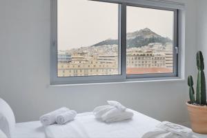 Nespecifikovaný výhled na hory nebo výhled na hory při pohledu z aparthotelu