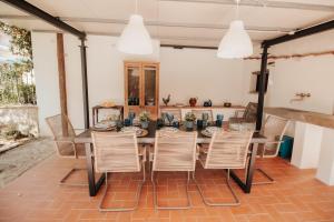 a dining room with a table and chairs at DONNA LAURA - Holiday Home in Arezzo +37 photos