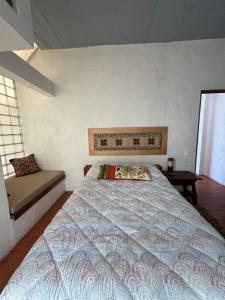 a bedroom with a large bed in a room at Habitación en casa panoramica in Morelia