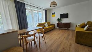Posezení v ubytování Apartamenty na Brzozowej 18