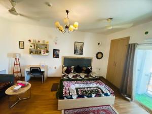 Postel nebo postele na pokoji v ubytování Dream Vibes Studio Apartment