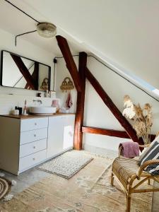 a bathroom with a sink and a mirror at Za Lasem Nad Wodą in Narty +93 photos