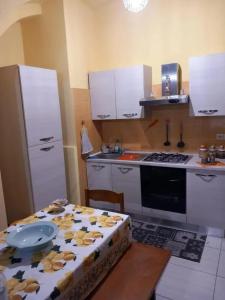 a kitchen with a table with a plate on it at Modern Studio in Catania with Air Conditioning in Catania