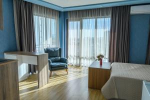Postel nebo postele na pokoji v ubytování Hotel Sunny