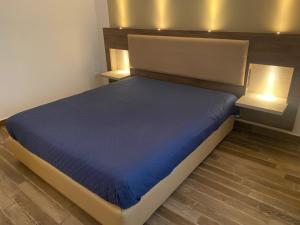 Postel nebo postele na pokoji v ubytování Lilly Apartment resort