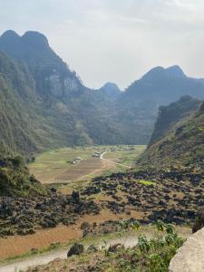a view of a valley with mountains in the background at Hà Giang Lake View House in Lan Hung