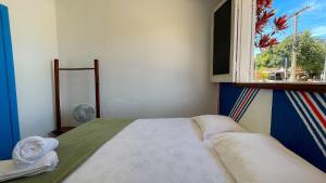 Postel nebo postele na pokoji v ubytování Hospedaria São Jorge