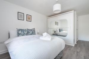 Ένα ή περισσότερα κρεβάτια σε δωμάτιο στο Bimpz apartment
