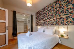 Ένα ή περισσότερα κρεβάτια σε δωμάτιο στο The Monroe cosy luxury in the heart of Perpignan