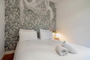 Ένα ή περισσότερα κρεβάτια σε δωμάτιο στο The Monroe cosy luxury in the heart of Perpignan +1 φωτογραφίες
