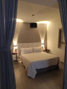 Ένα ή περισσότερα κρεβάτια σε δωμάτιο στο Loft CENTRO Con Parking privado GRATIS +5 φωτογραφίες