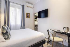 Postel nebo postele na pokoji v ubytování Best Western Plus Hôtel Brice Garden Nice