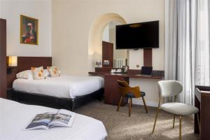 Postel nebo postele na pokoji v ubytování Best Western Plus Hôtel Brice Garden Nice