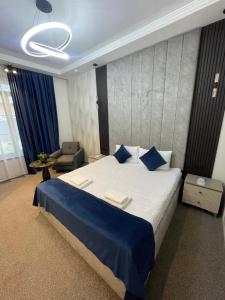 Voodi või voodid majutusasutuse Zangu Hotel toas